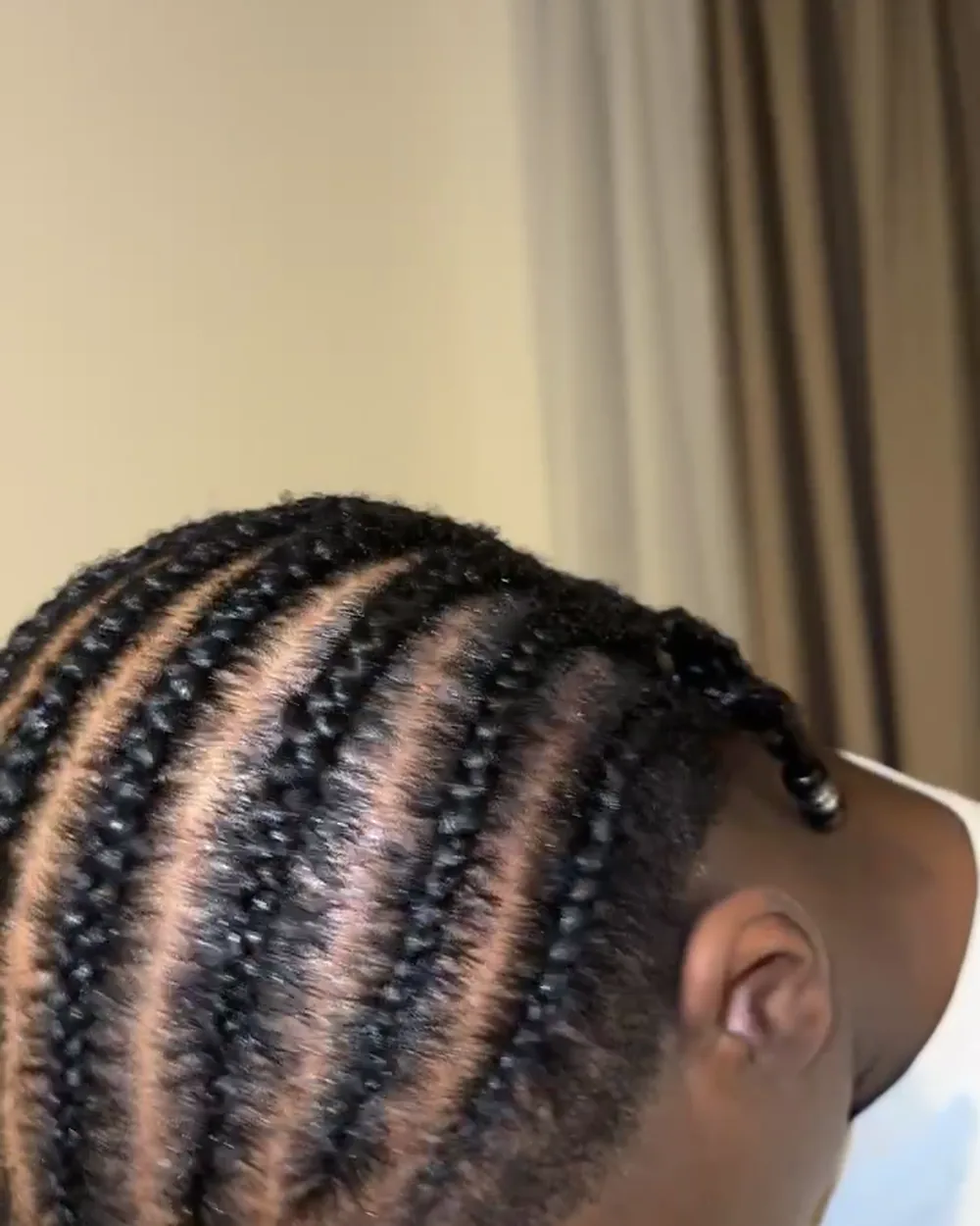 Neat straight back cornrows on natural hair